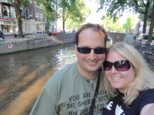 the Nola Nerd Couple Surrounded by Water and Orange in Amsterdam