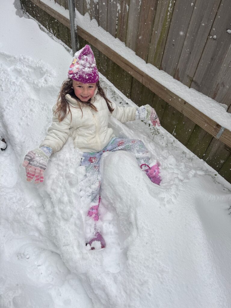 Little girl in the snow in south Louisiana 