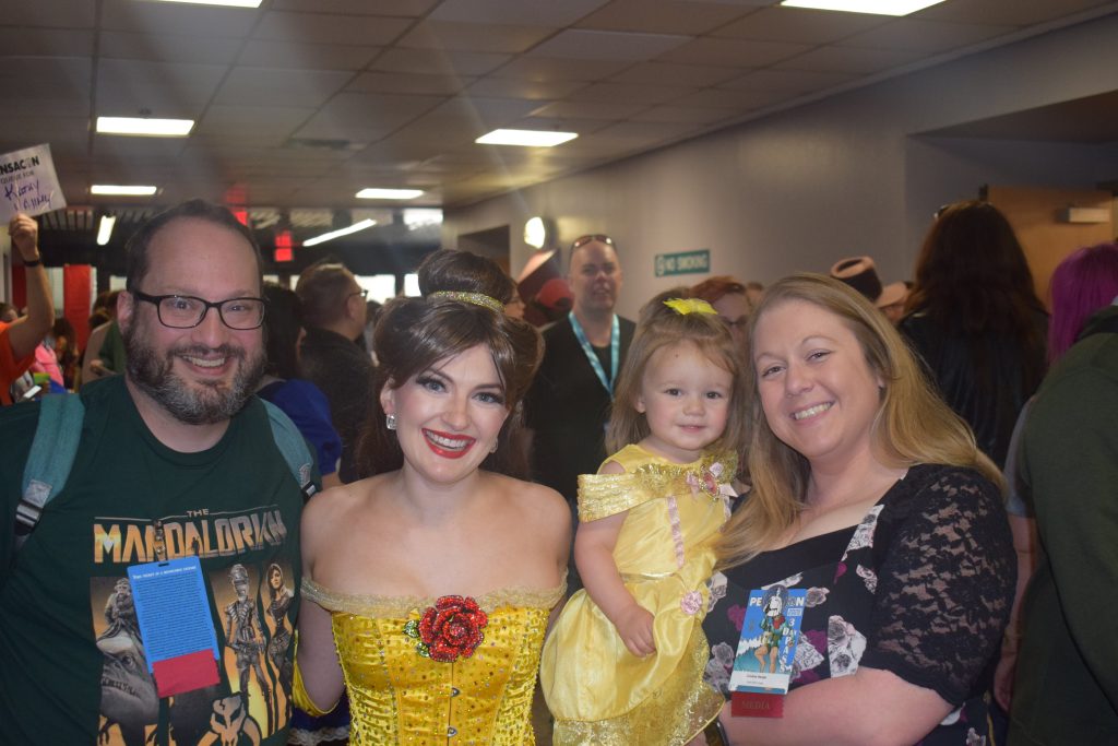 Family with cosplayer.